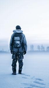 Preview wallpaper man, snow, tourist, backpack, winter
