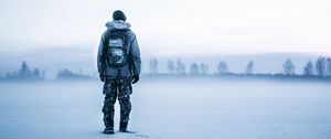 Preview wallpaper man, snow, tourist, backpack, winter