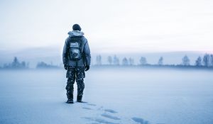 Preview wallpaper man, snow, tourist, backpack, winter