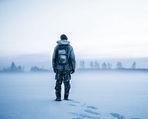 Preview wallpaper man, snow, tourist, backpack, winter