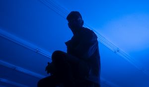 Preview wallpaper man, stepladder, dark, neon, blue