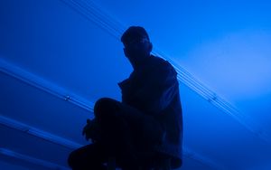 Preview wallpaper man, stepladder, dark, neon, blue