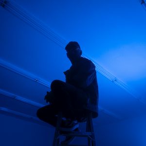 Preview wallpaper man, stepladder, dark, neon, blue