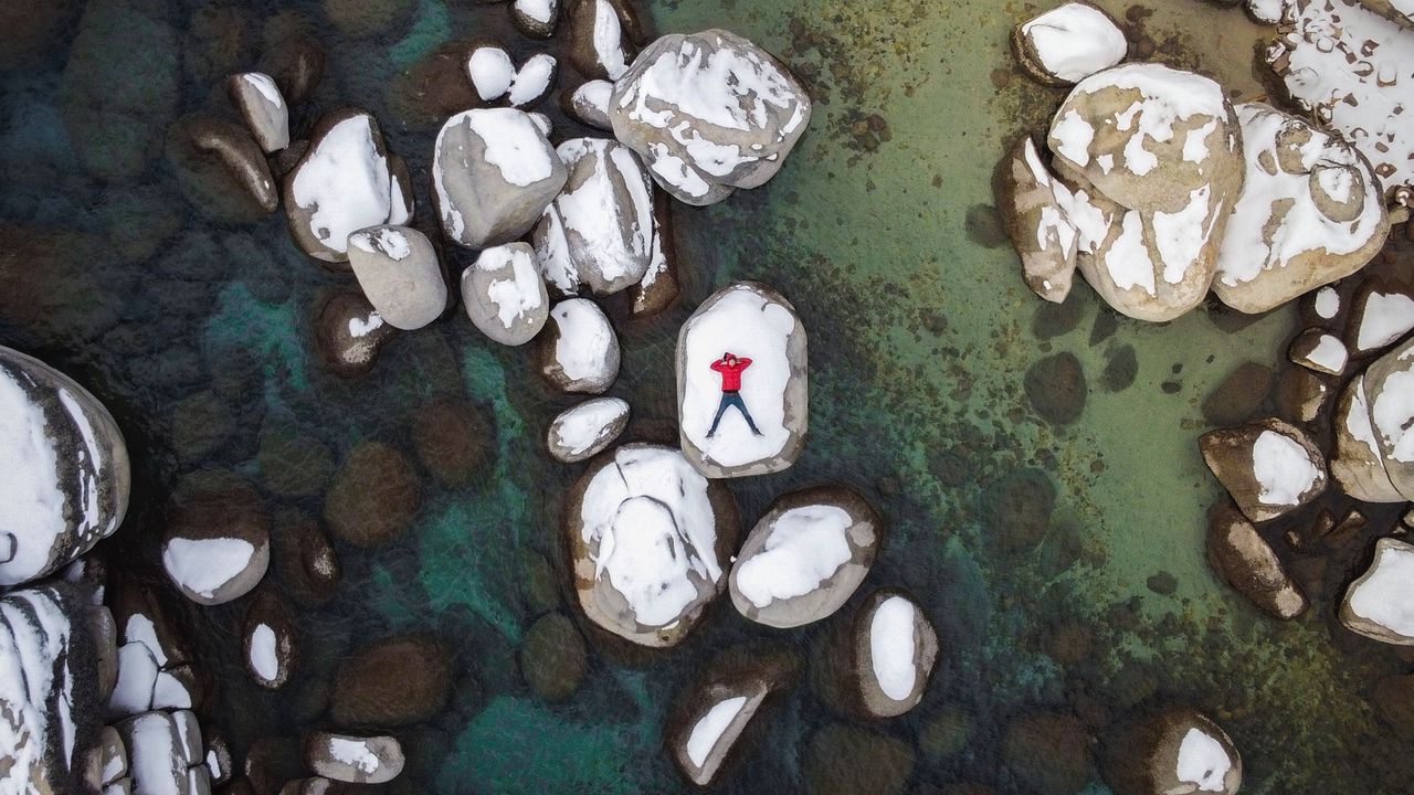 Wallpaper man, stones, rocks, snow, aerial view