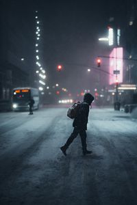 Preview wallpaper man, street, night, snow