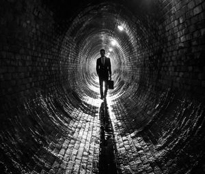 Preview wallpaper man, suit, tunnel, black and white