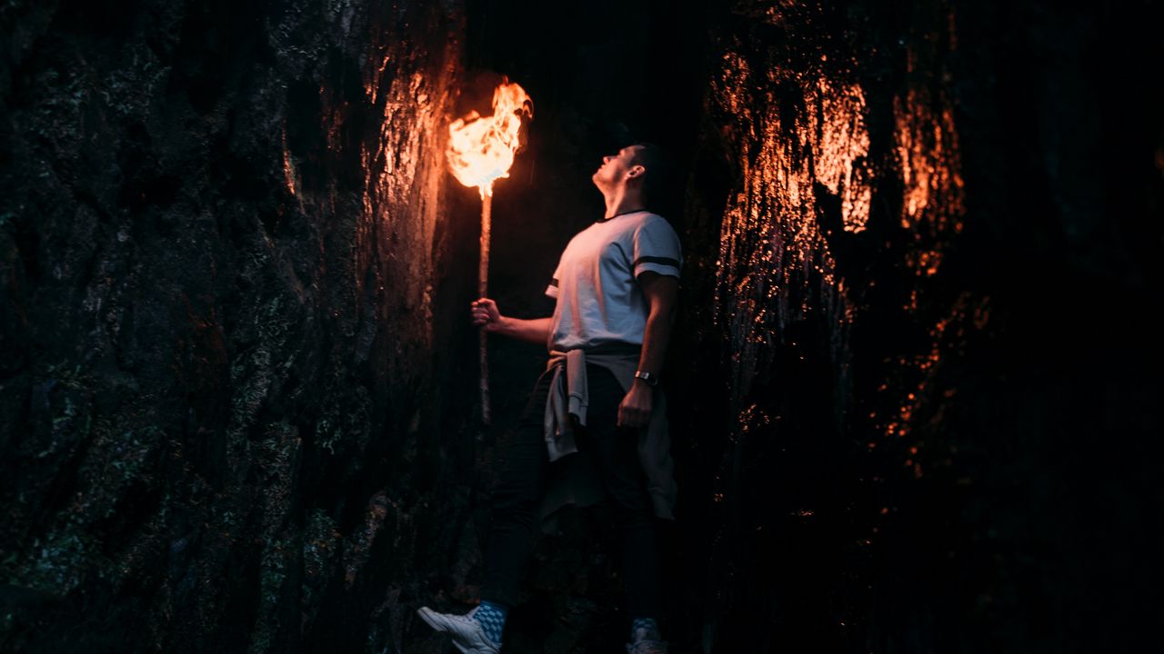 Wallpaper man, torch, cave, dark