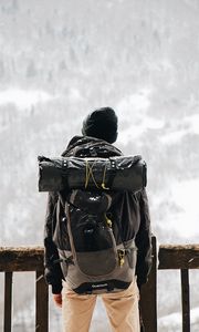 Preview wallpaper man, tourist, backpack, snow, travel