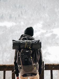 Preview wallpaper man, tourist, backpack, snow, travel