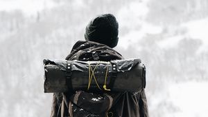 Preview wallpaper man, tourist, backpack, snow, travel