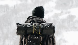 Preview wallpaper man, tourist, backpack, snow, travel