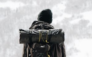 Preview wallpaper man, tourist, backpack, snow, travel