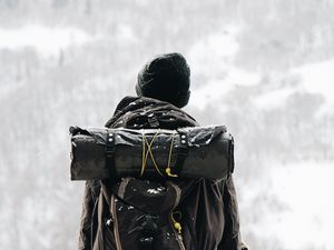 Preview wallpaper man, tourist, backpack, snow, travel