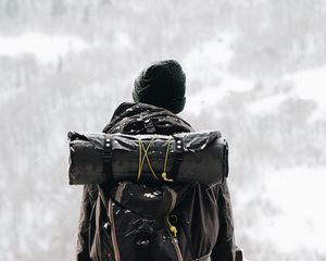 Preview wallpaper man, tourist, backpack, snow, travel
