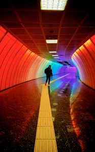 Preview wallpaper man, tunnel, backlight, colorful, rainbow