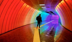 Preview wallpaper man, tunnel, backlight, colorful, rainbow