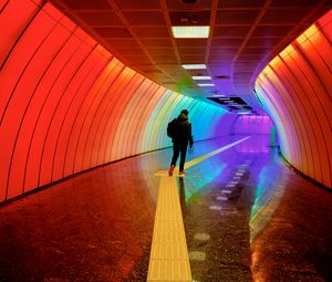 Preview wallpaper man, tunnel, backlight, colorful, rainbow