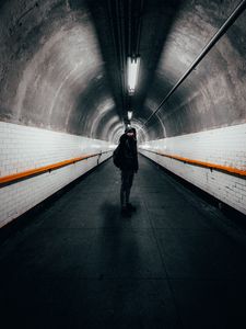 Preview wallpaper man, tunnel, photographer, camera, alone