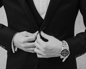 Preview wallpaper man, tuxedo, bw, suit, watch, groom