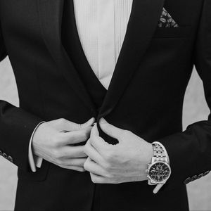 Preview wallpaper man, tuxedo, bw, suit, watch, groom