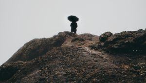 Preview wallpaper man, umbrella, alone, sad, silhouette, mountain, hill