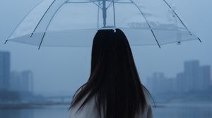 Preview wallpaper man, umbrella, girl, rain, loneliness, lonely