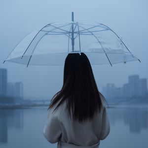 Preview wallpaper man, umbrella, girl, rain, loneliness, lonely