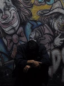 Preview wallpaper man, wall, graffiti, sadness, loneliness