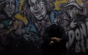 Preview wallpaper man, wall, graffiti, sadness, loneliness