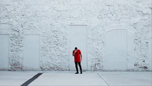 Preview wallpaper man, wall, white, contrast