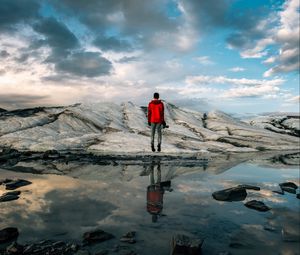 Preview wallpaper man, water, glacier, reflection