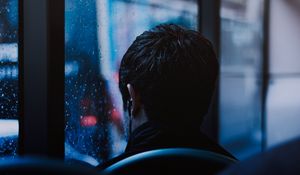 Preview wallpaper man, window, rain, headphones, melancholy, trip