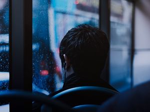 Preview wallpaper man, window, rain, headphones, melancholy, trip