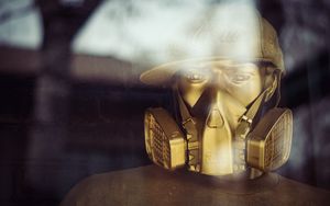 Preview wallpaper mannequin, mask, cap, gold