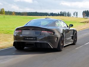 Preview wallpaper mansory, cyrus, 2009, black, rear view, style, sports, aston martin, cars, speed, nature, trees, grass, asphalt