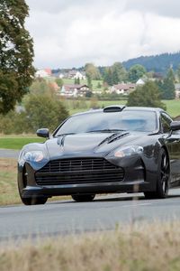 Preview wallpaper mansory cyrus, 2009, black, front view, style, aston martin, houses, trees, asphalt