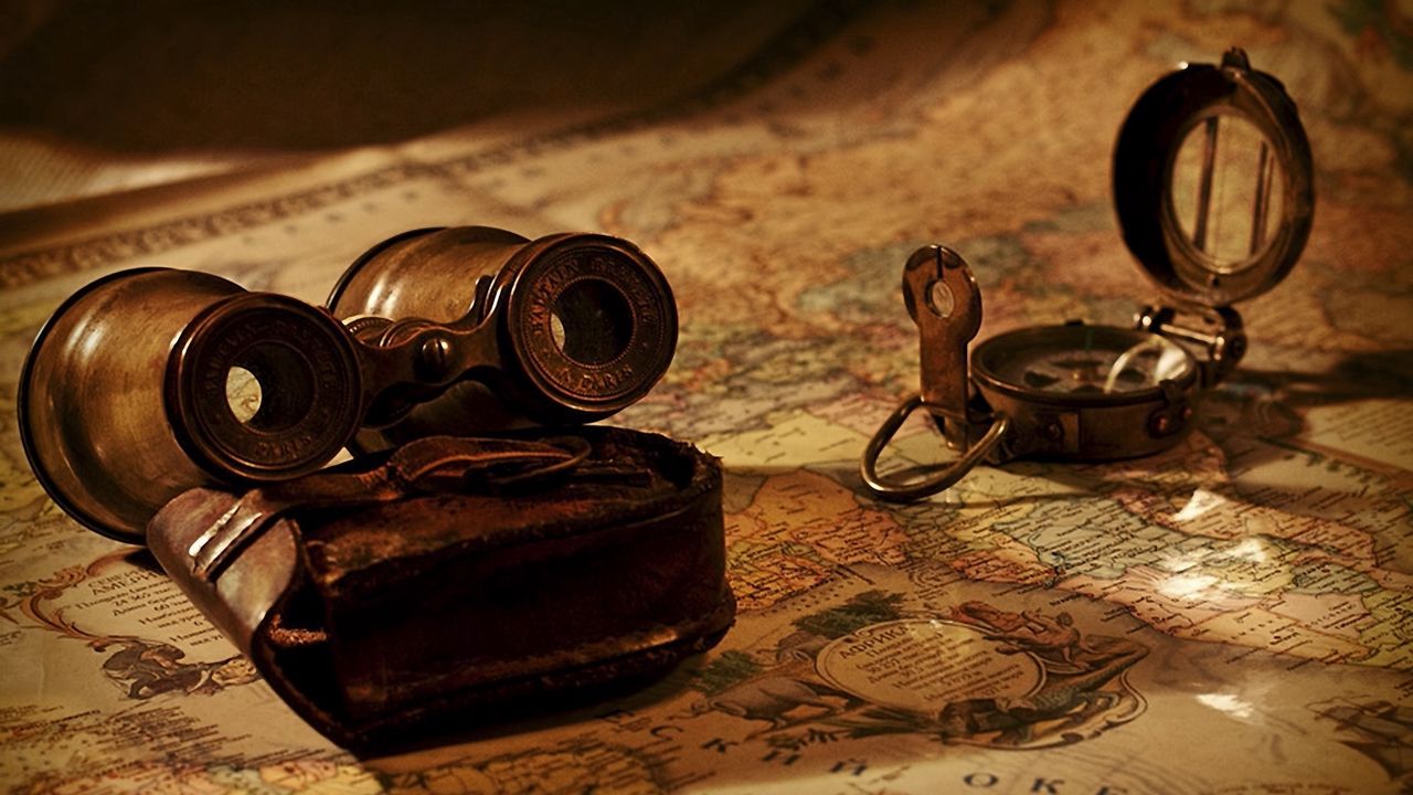 Wallpaper map, compass, binoculars