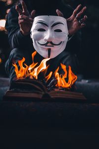 Preview wallpaper mask, bonfire, flame, hands, dark