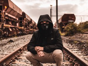 Preview wallpaper mask, hood, railroad, rails, man