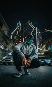 Preview wallpaper mask, man, anonymous, glow, city, street