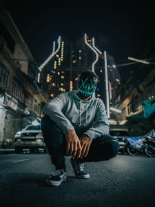 Preview wallpaper mask, man, anonymous, glow, city, street