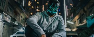 Preview wallpaper mask, man, anonymous, glow, city, street