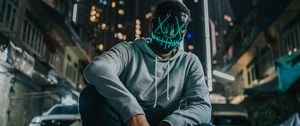 Preview wallpaper mask, man, anonymous, glow, city, street