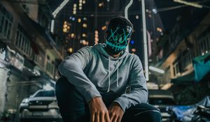 Preview wallpaper mask, man, anonymous, glow, city, street