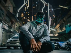 Preview wallpaper mask, man, anonymous, glow, city, street