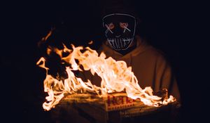 Preview wallpaper mask, newspaper, fire, man, dark