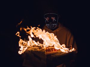 Preview wallpaper mask, newspaper, fire, man, dark