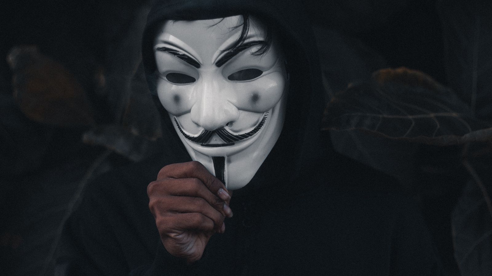 Download wallpaper 1600x900 mask, person, anonymous widescreen 16:9 hd  background