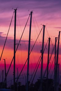 Preview wallpaper masts, silhouettes, sunset, dark