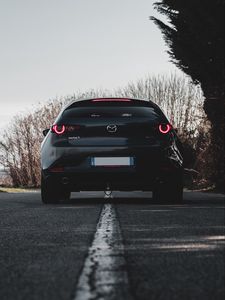 Preview wallpaper mazda 3, mazda, car, black, back view, road